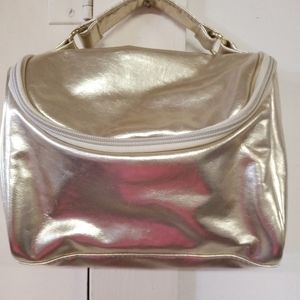 Metallic gold makeup bag